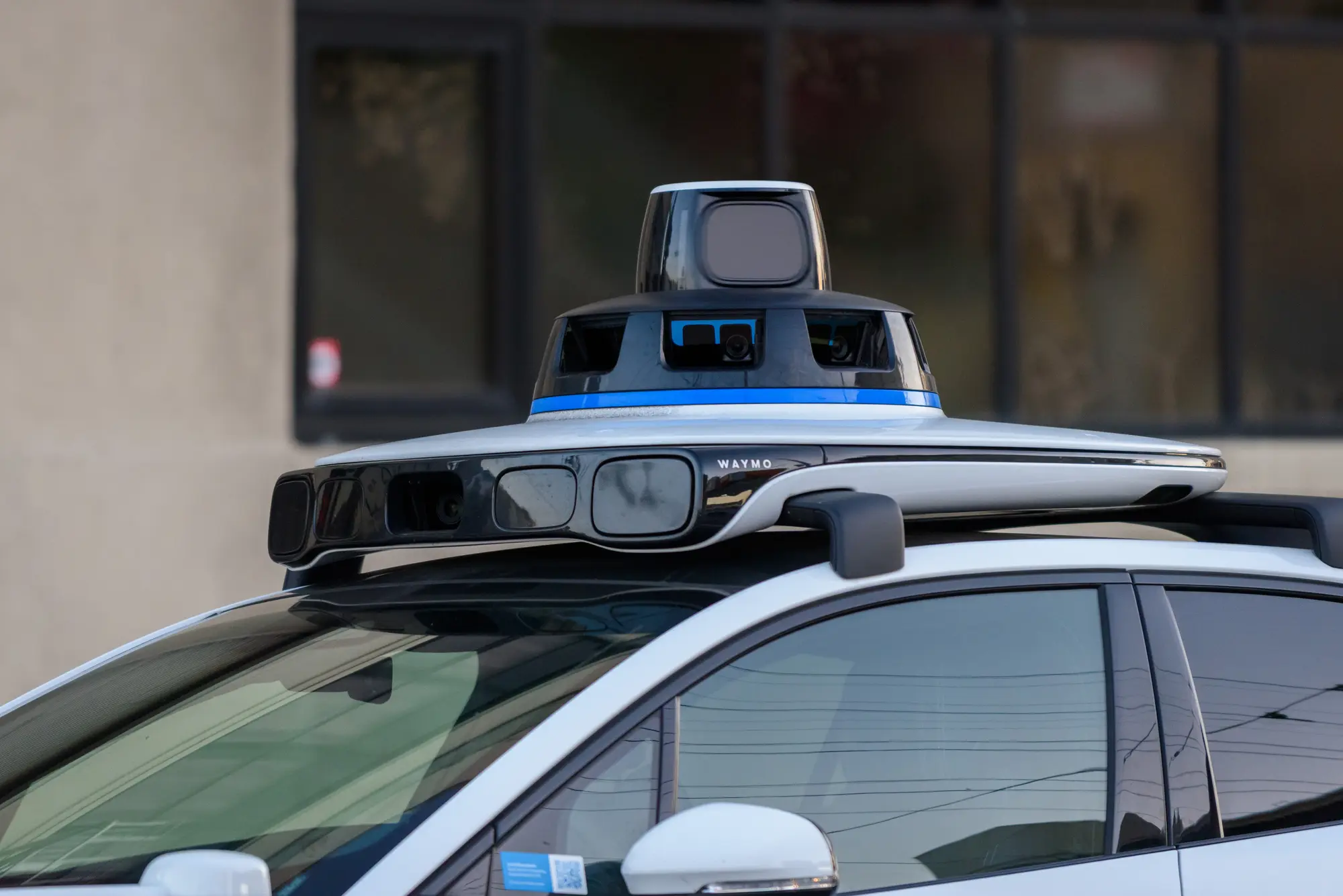 Autonomous-vehicle sensor array under inspection